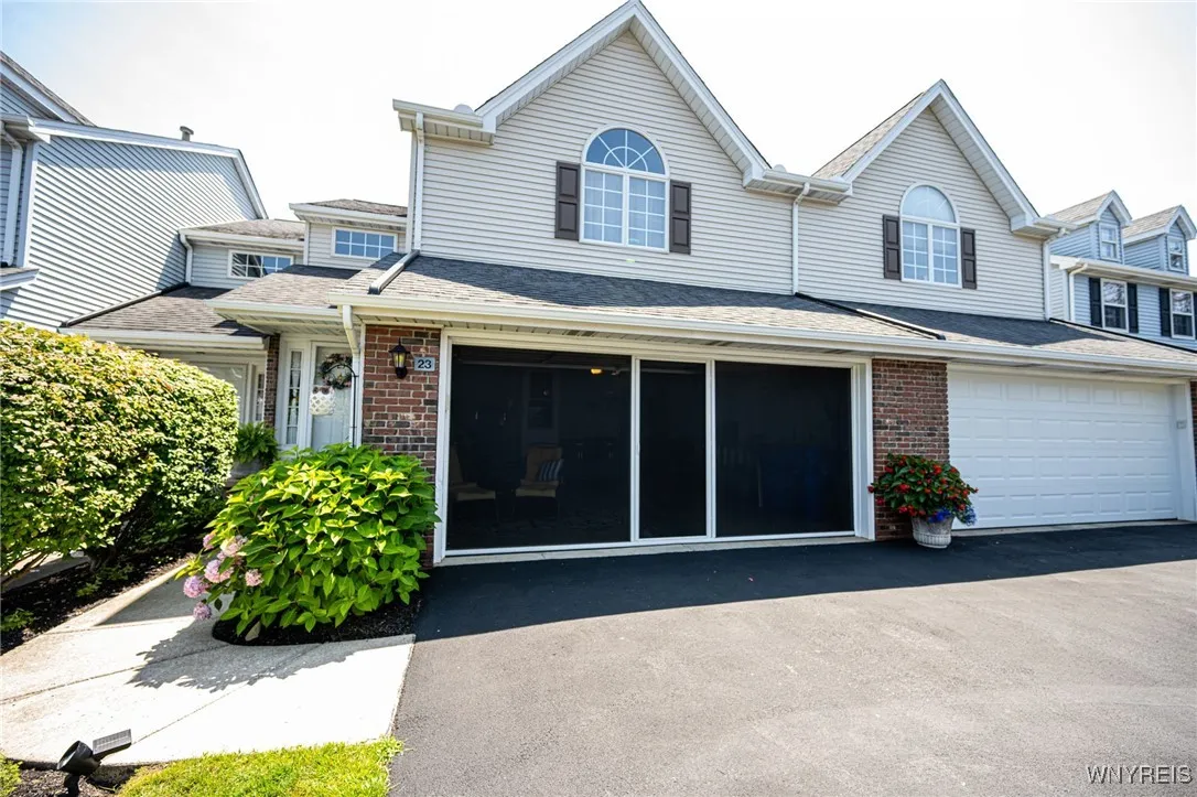Screened in garage door that opens like a traditional garage door.