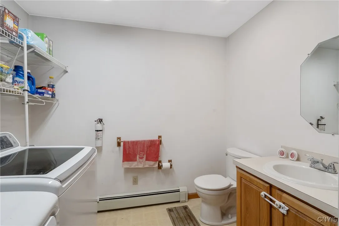 Convenient half bath with laundry!