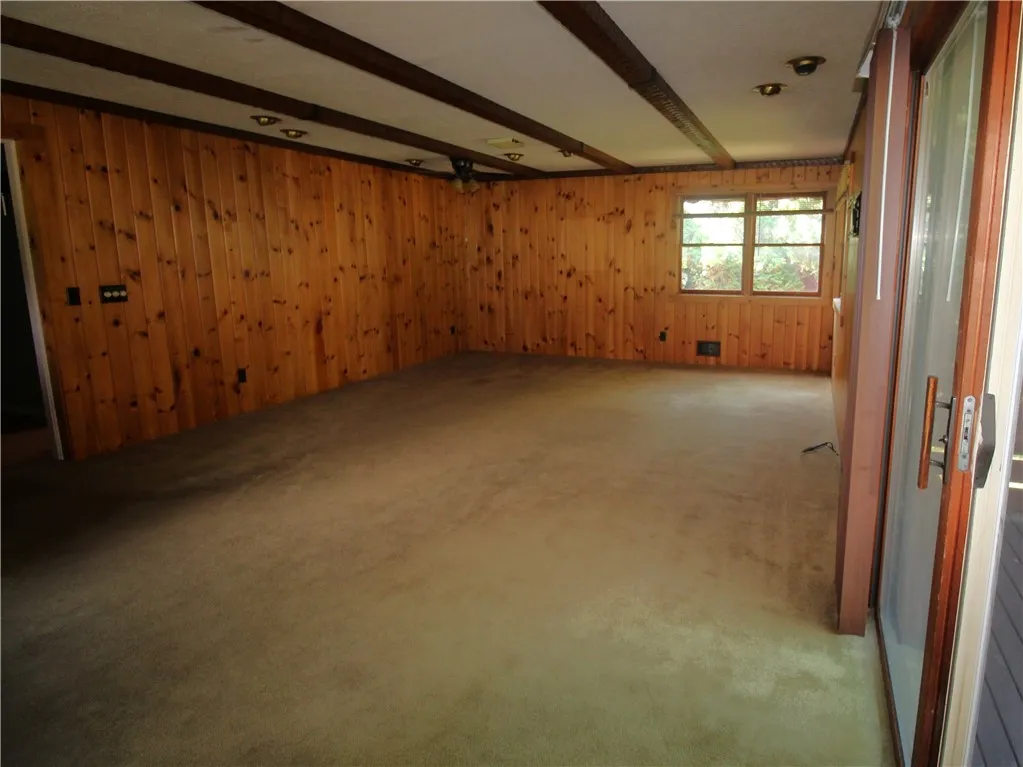 back family room with sliding doors to deck