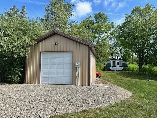16x20 shop! Great space for all of yours toys with Propane WALL UNIT . 
Toasty warm in the winter months.