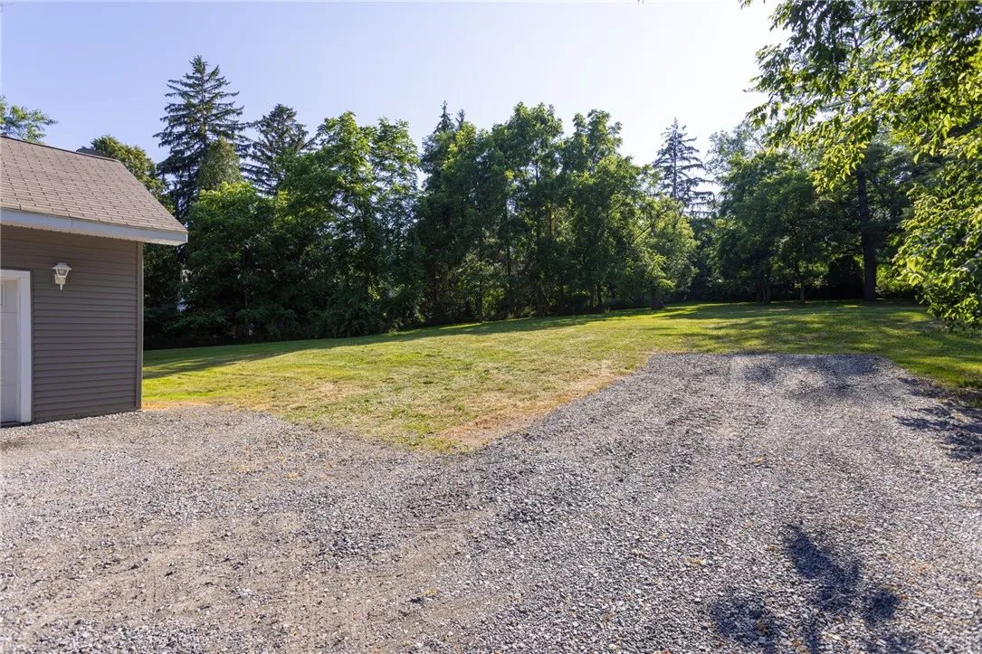 Large gravel drive & parking area