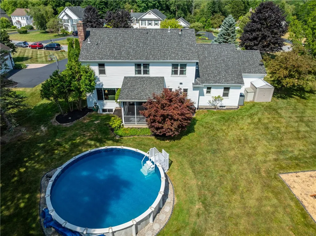 Flat Backyard with Heated Pool, Playset, Shed and Mature Trees