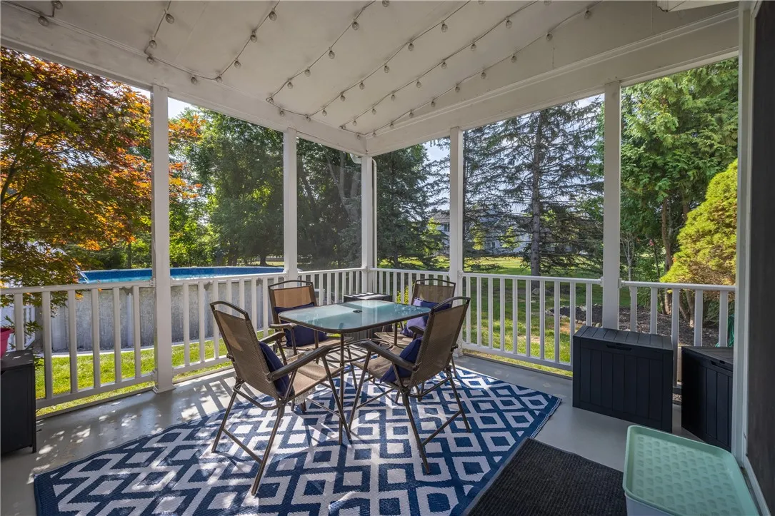 Screened-in Porch overlooking the backyard