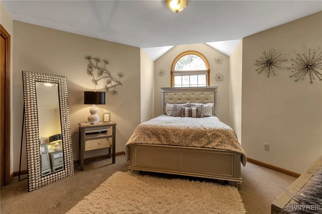 Second bedroom with Palladian window. Large closet has attic access.