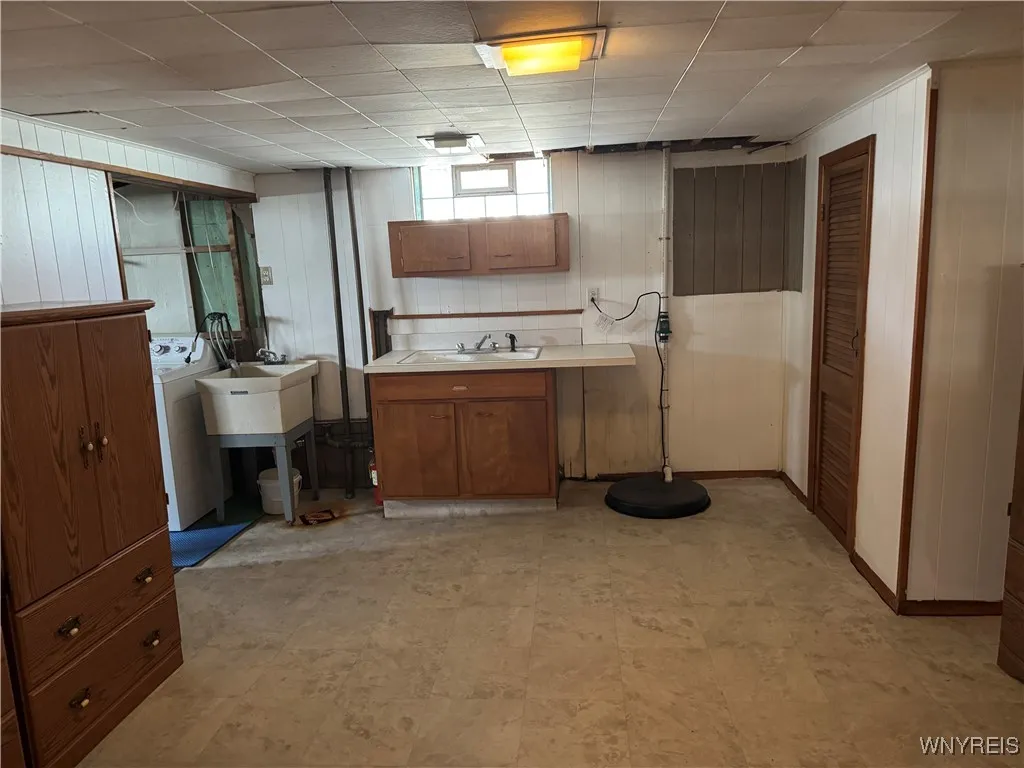 Lots of storage in this basement 'hobby' room.