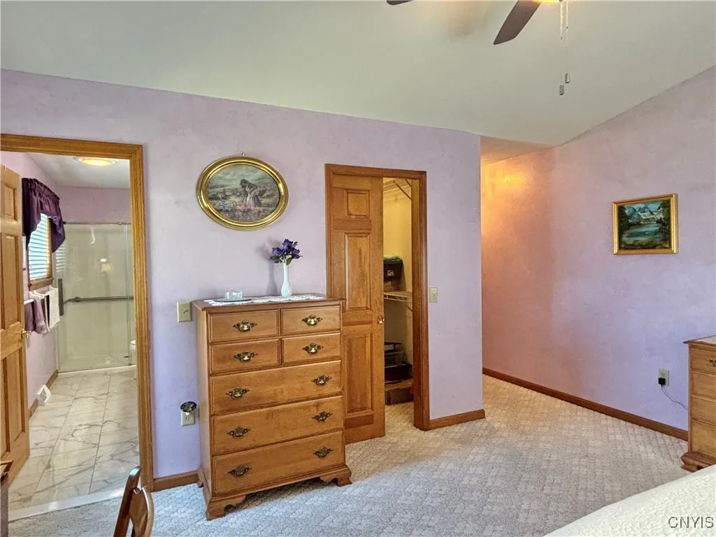 Primary bedroom looking towards primary bath.