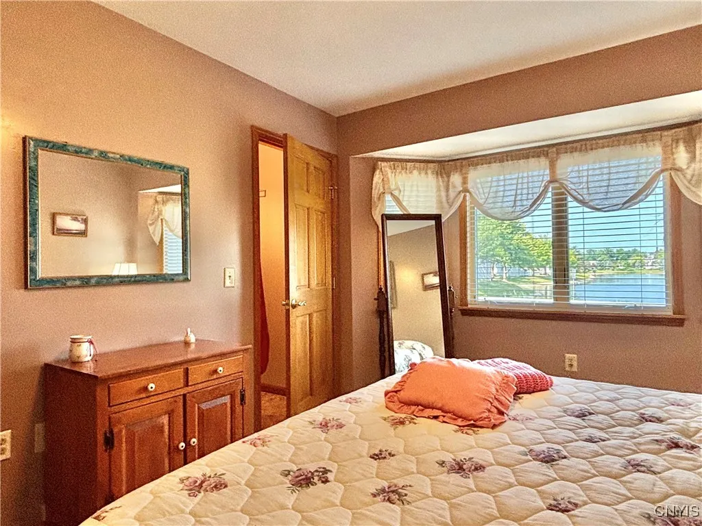 Guest bedroom.  Notice the walk in closet and bay window.