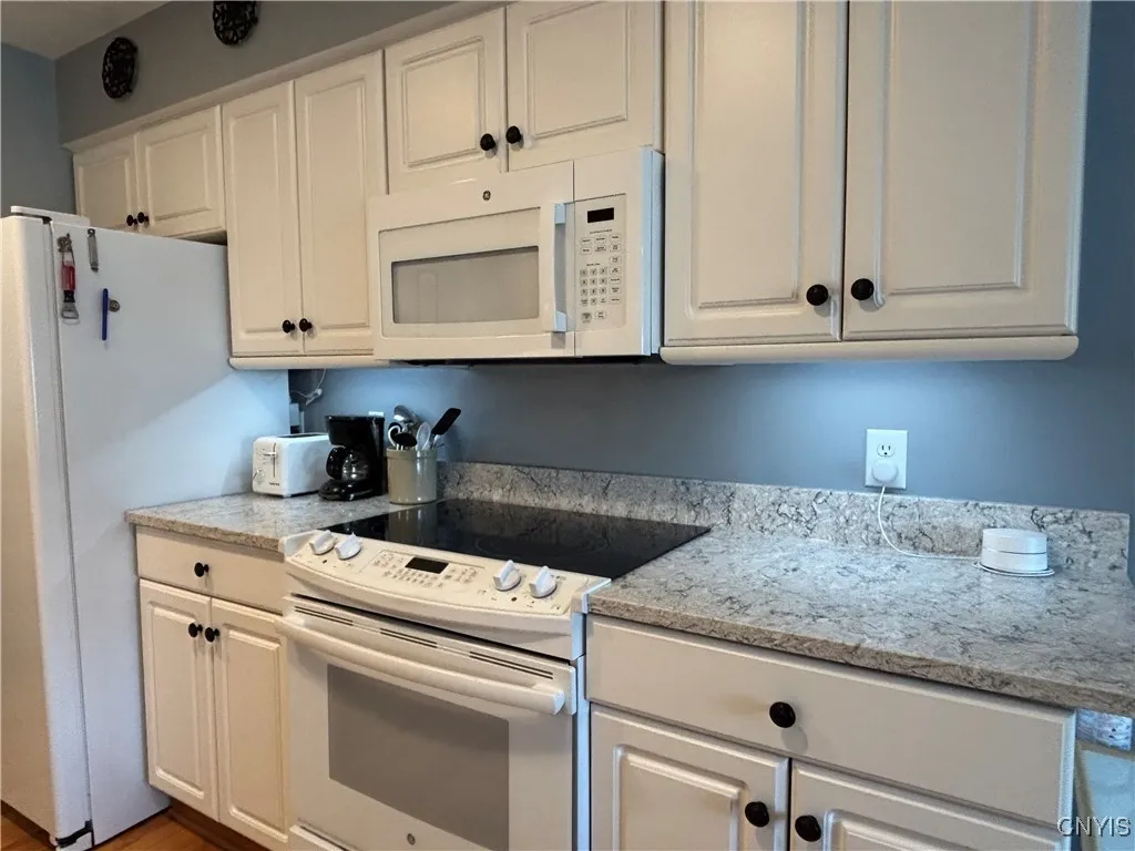 Kitchen.  Appliances are newer.