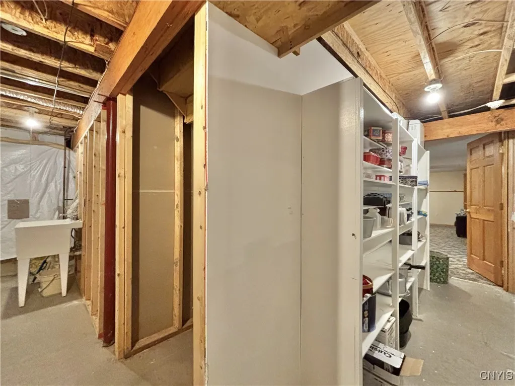 Storage area.  Notice the laundry sink.