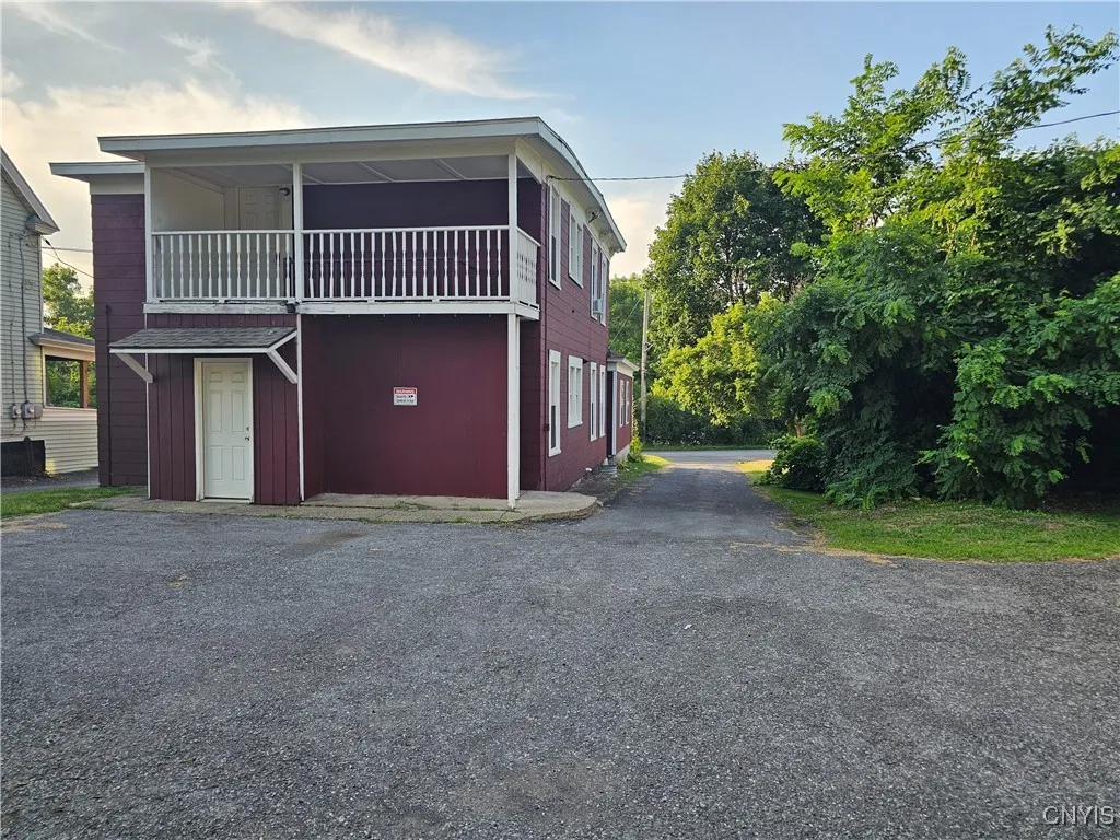 BAck of home where off street parking is.