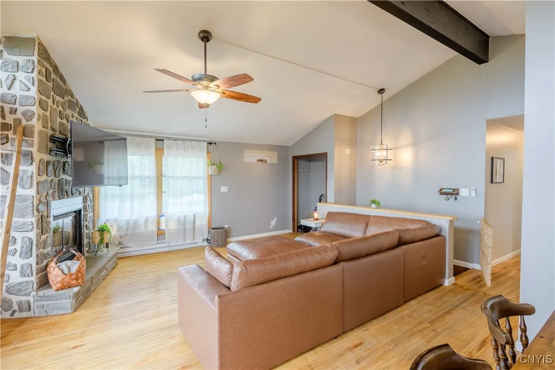 Living room with a wonderful wood fireplace for cozy days and evenings.