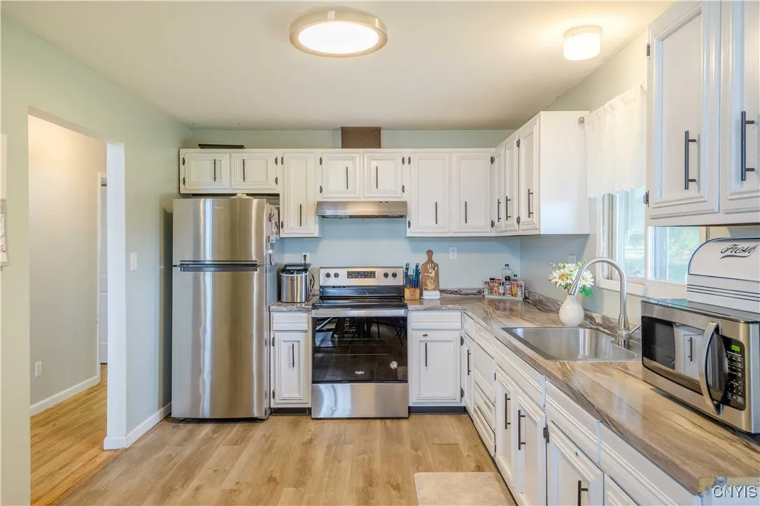 Kitchen with a beautiful butcher block countertop!