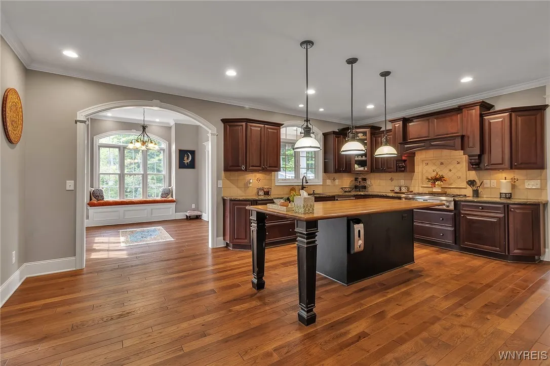 This kitchen is a chefs dream! The island is massive, perfect for buffet set ups or eating around!