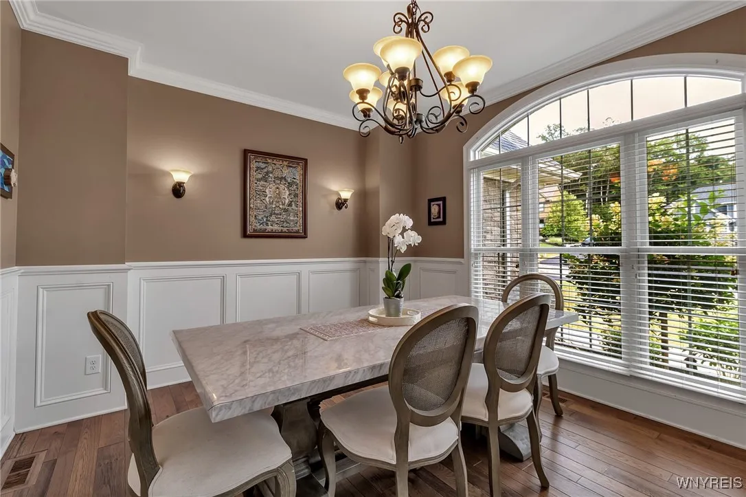 A beautiful window in this Formal Dining space...a pleasure to host dinners here!