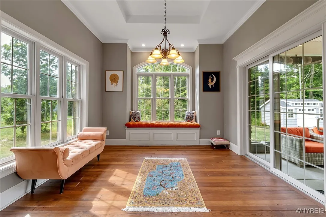 Plenty of sunshine here!  Sliding door to your multiple porches!