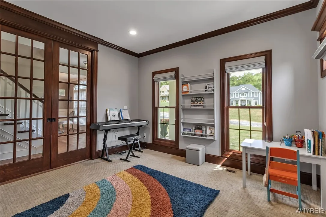 Front Room is versatile with glass pocket doors for privacy if wanted.