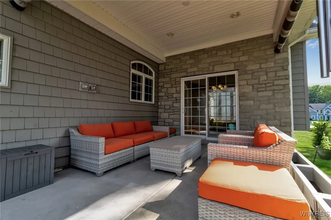 Covered patio with recessed lighting.