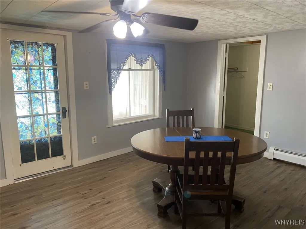 formal dining room with access to enclosed porch