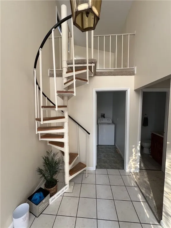 Entry Foyer; Loft; Main Level Laundry Through the Open Door