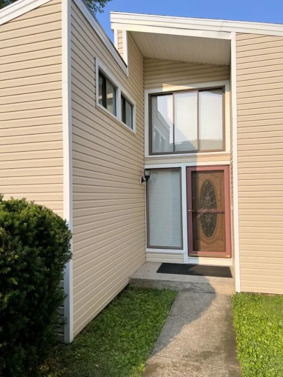 This special entrance leads to an interior loft and vaulted ceilings.