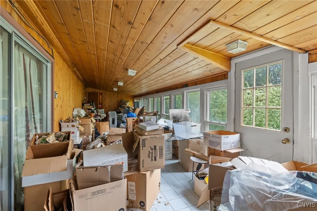 ALL DEBRIS WILL BE REMOVED BY CLOSING FROM THIS LARGE OPEN SUN ROOM/PORCH!