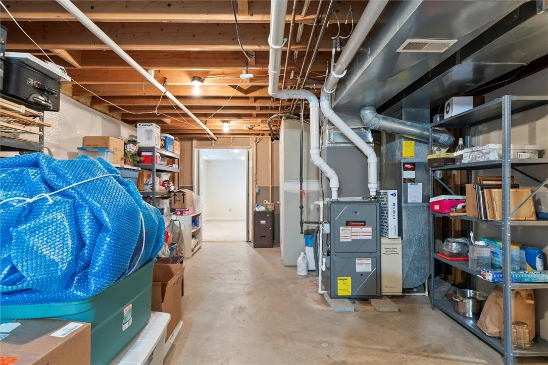 Unfinished part of the basement includes a cedar closet and tons of storage space.