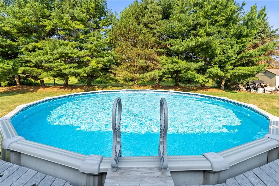 Beautiful Trex deck and above ground pool.