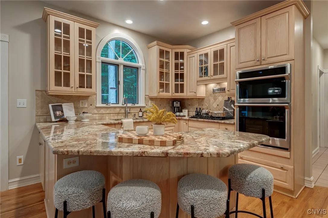 Your guests can cozy up to the island while you are in the Kitchen