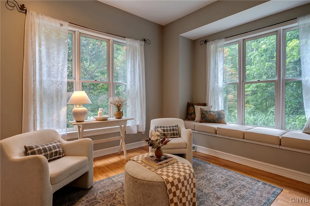 The front living space offers built in window seating