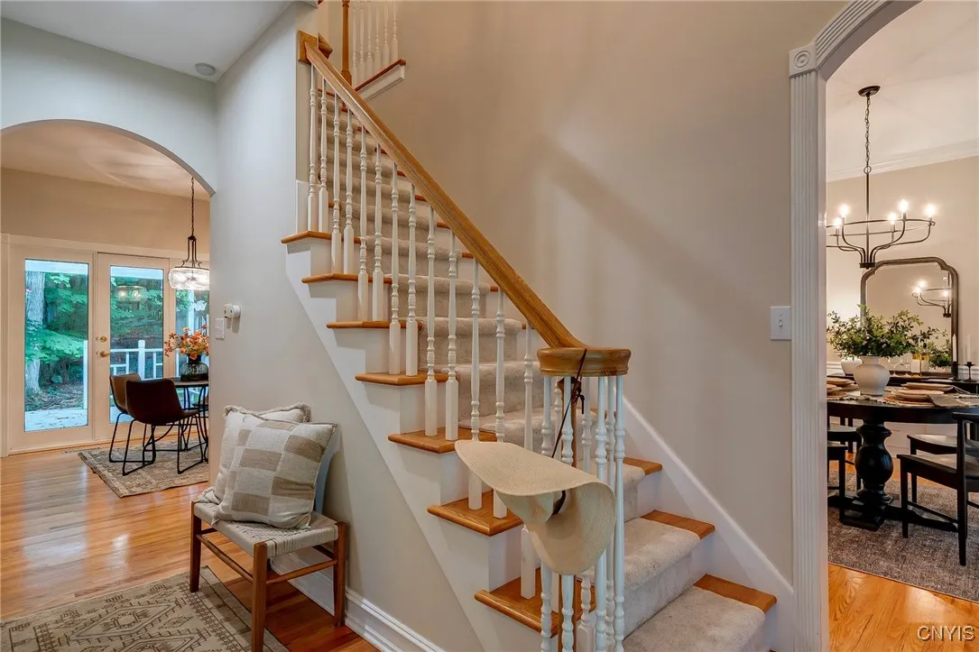 Stunning Custom Stairway leads you to the 4 Bedrooms and 2 Full Baths