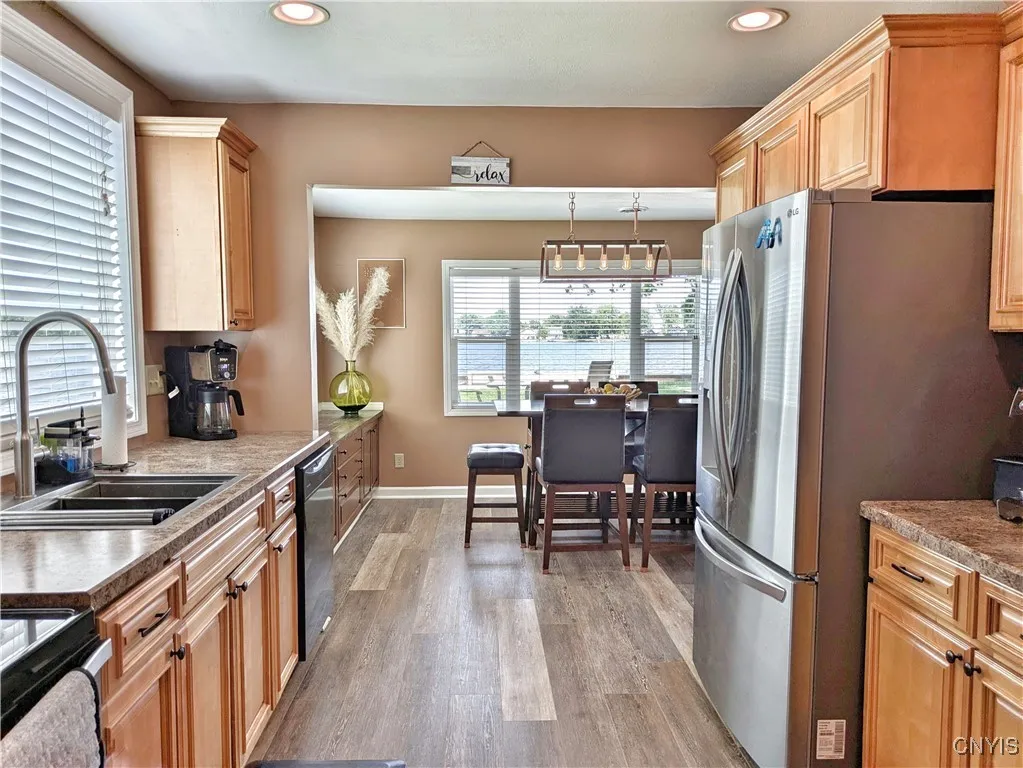 The spacious Kitchen and easy flow into the Dining Area.