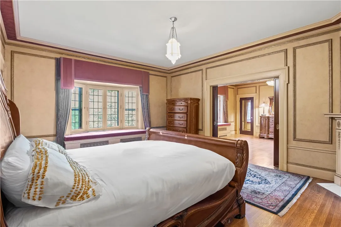 The primary bedroom features its own window seat.
