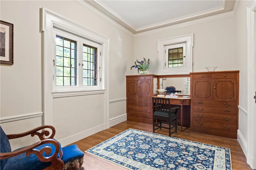 The dressing room has a built-in vanity of Tiger maple.
