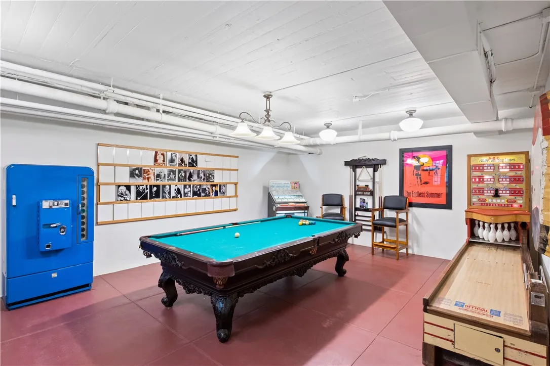 Enjoy the gaming room, complete with a pool table, pinball machine, Shuffle Alley Bowling Machine, and a jukebox for your favorite music.