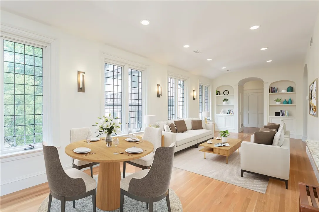 The carriage house has a living room, kitchen, dining area, and breakfast bar. Details include leaded glass, built-ins, glass knobs, instant on-lite closets, instant on hot water heater and its own washer/dryer.