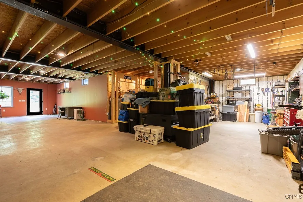 The next owner has endless possibilities to add dry, solid, warm living space in the lower level—the sky truly is the limit. Once again, note the steel beams and 2x12 floor joists—outstanding construction throughout!





