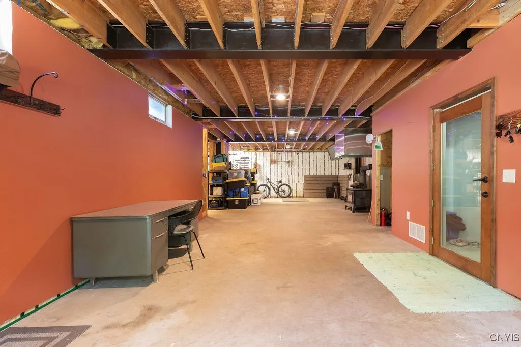 This walk-out basement forms the strong foundation of this amazing home. Notice the steel beams designed to support the structure for centuries to come!





