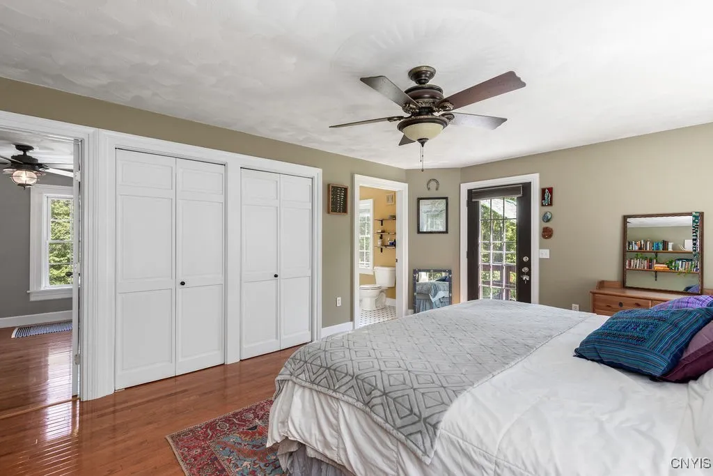 Primary bedroom with two good-sized closets and stunning oak flooring throughout the entire second floor—wow, solid quality!