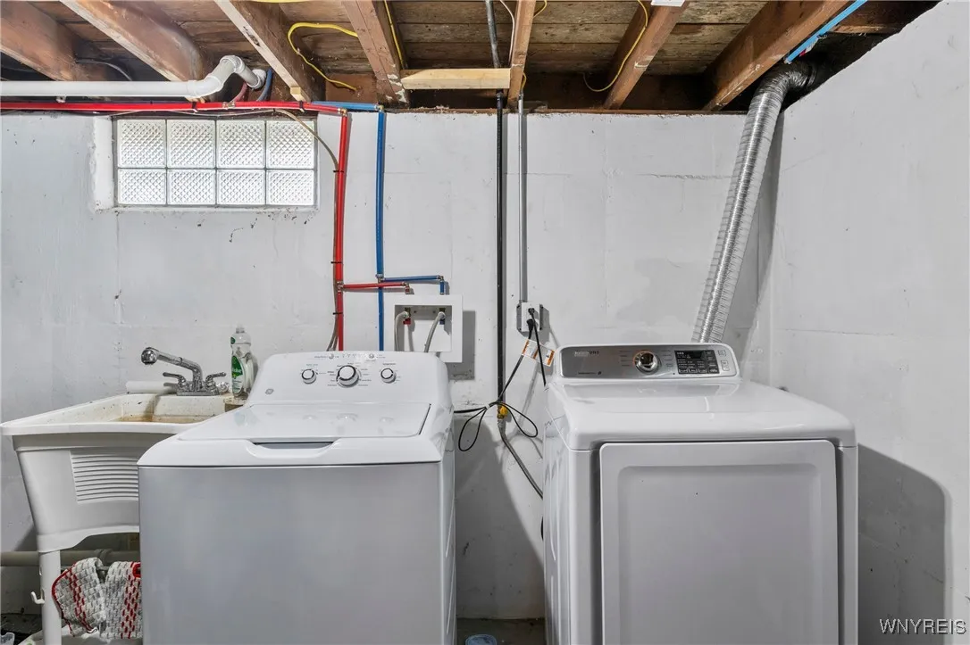 washer and dryer included next to the utility sink