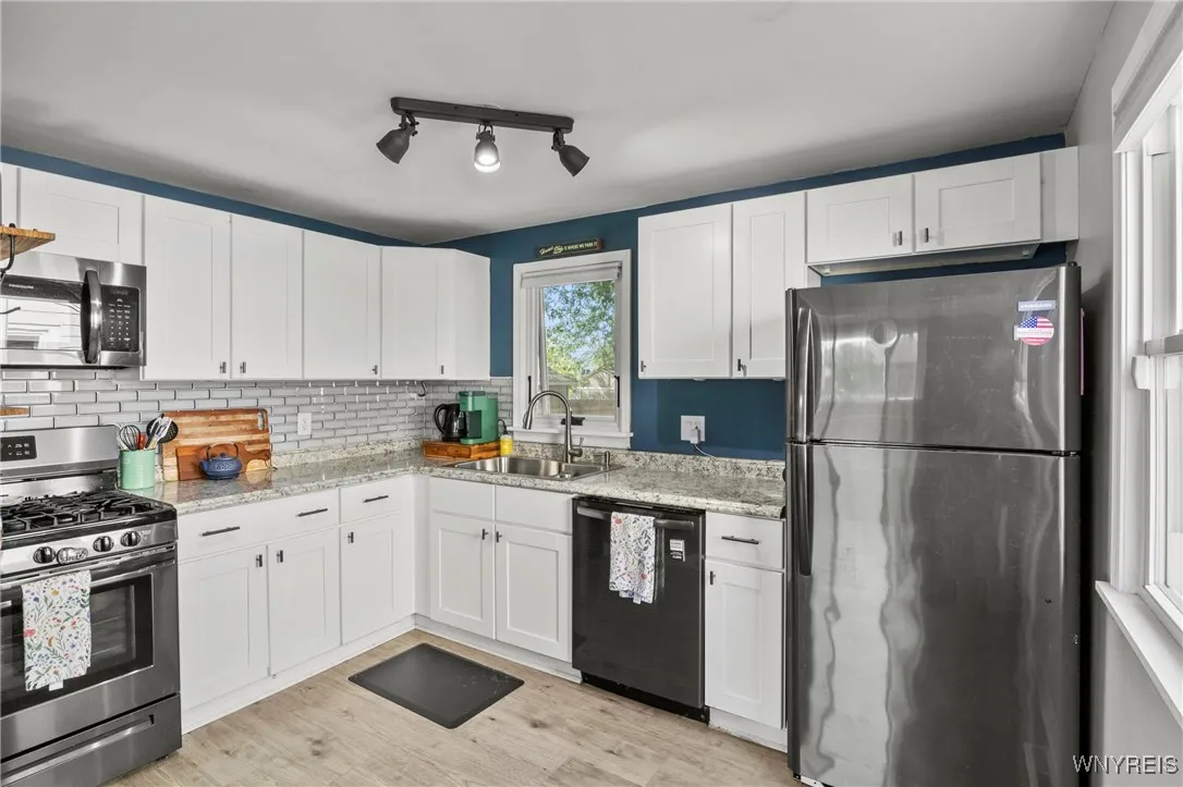 eat in kitchen with stainless steel appliances included
