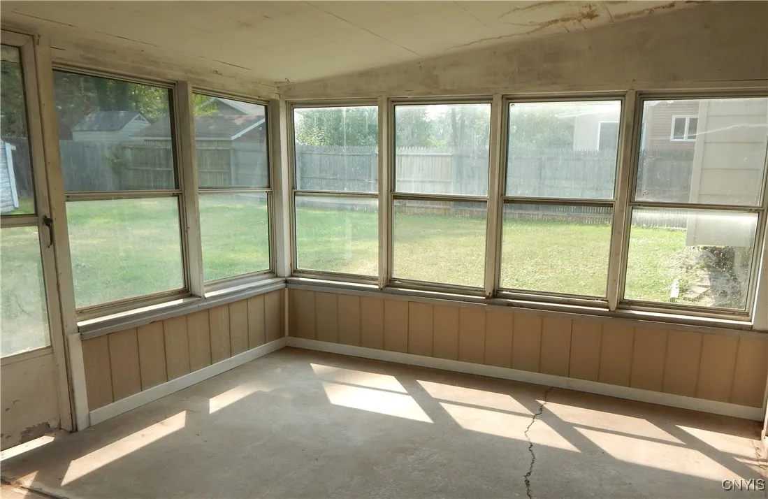 Enclosed back porch.
