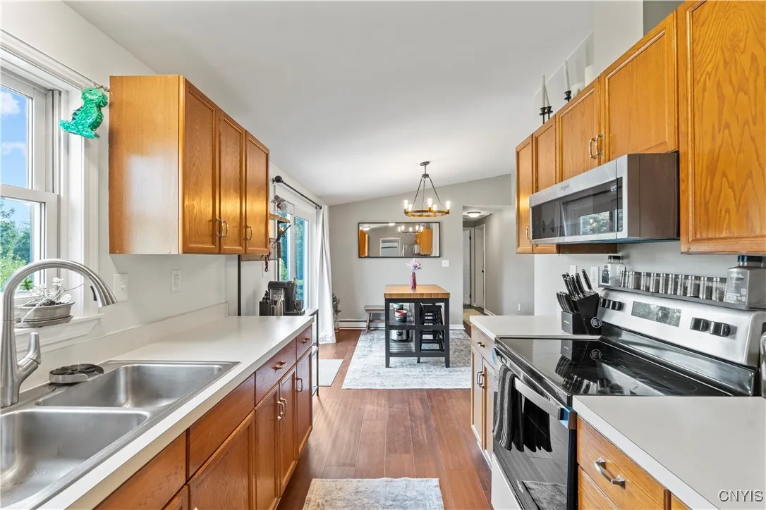 Galley kitchen with large eat-in dining area