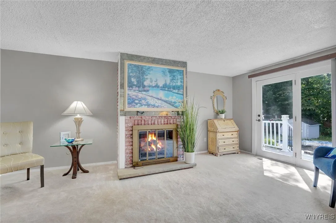 FAMILY ROOM ADJACENT TO KITCHEN- SLIDER GOES TO BACKYARD