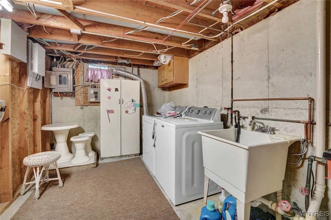 LAUNDRY AREA IN FULL BASEMENT