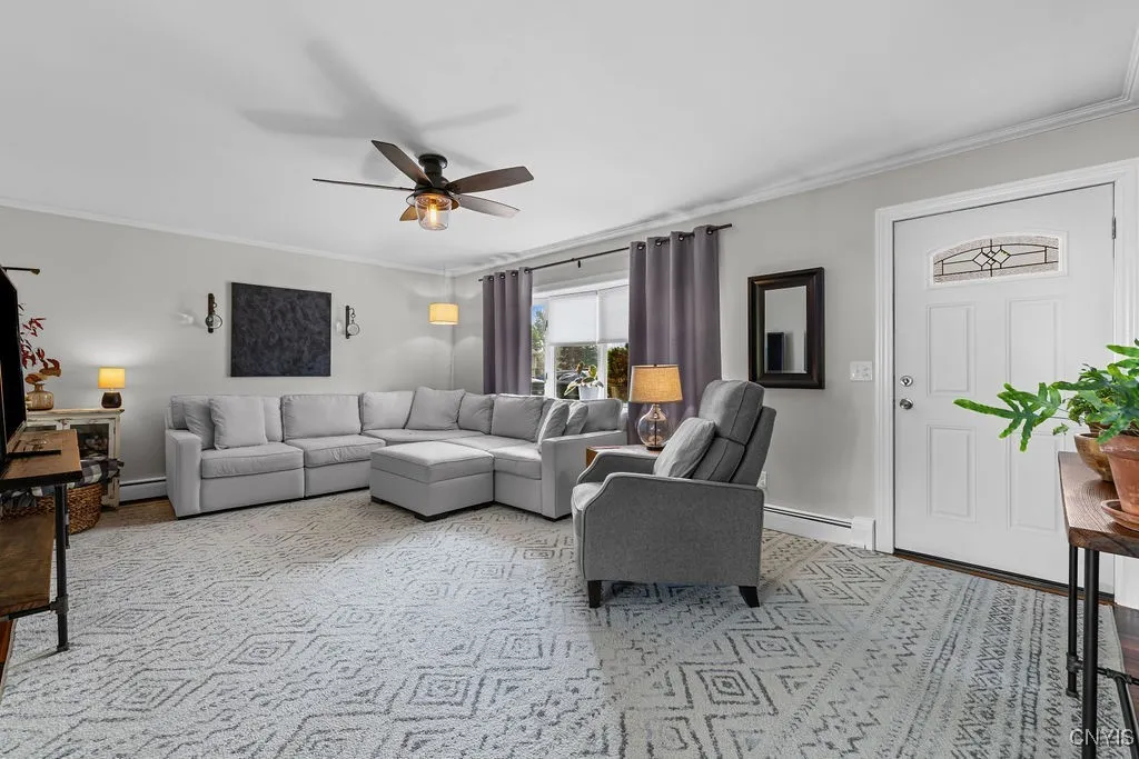 Enter from front door into a spacious living room.