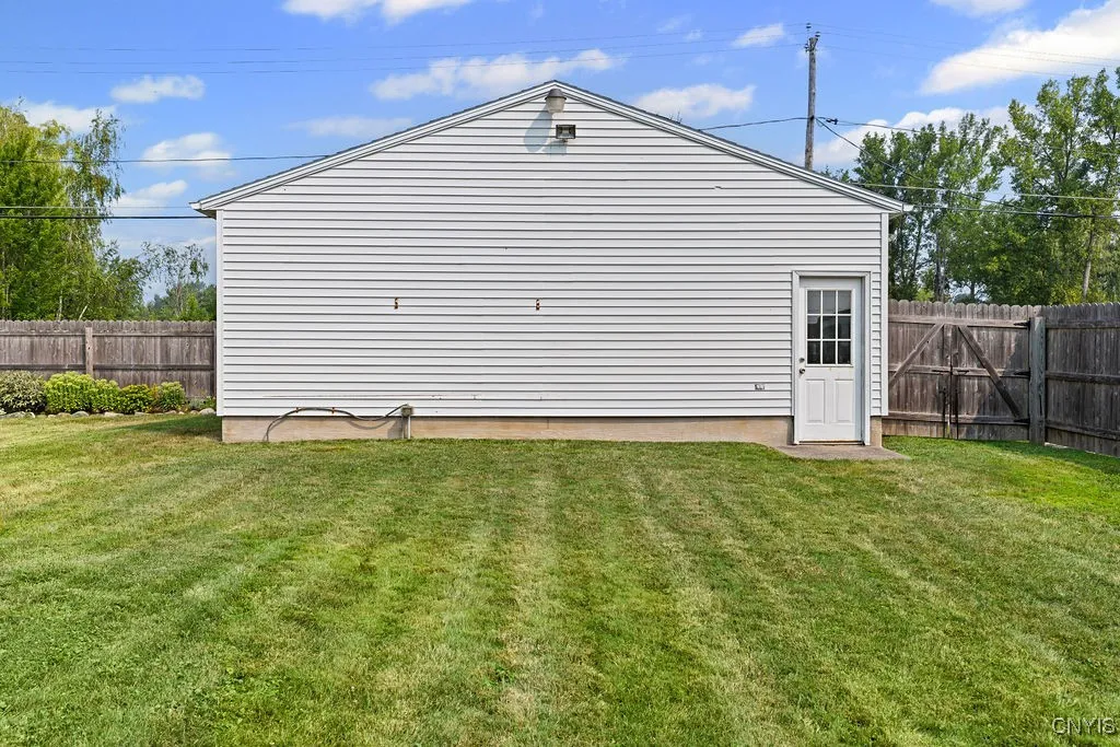 On the back of the lot is a large 2 car detached garage!