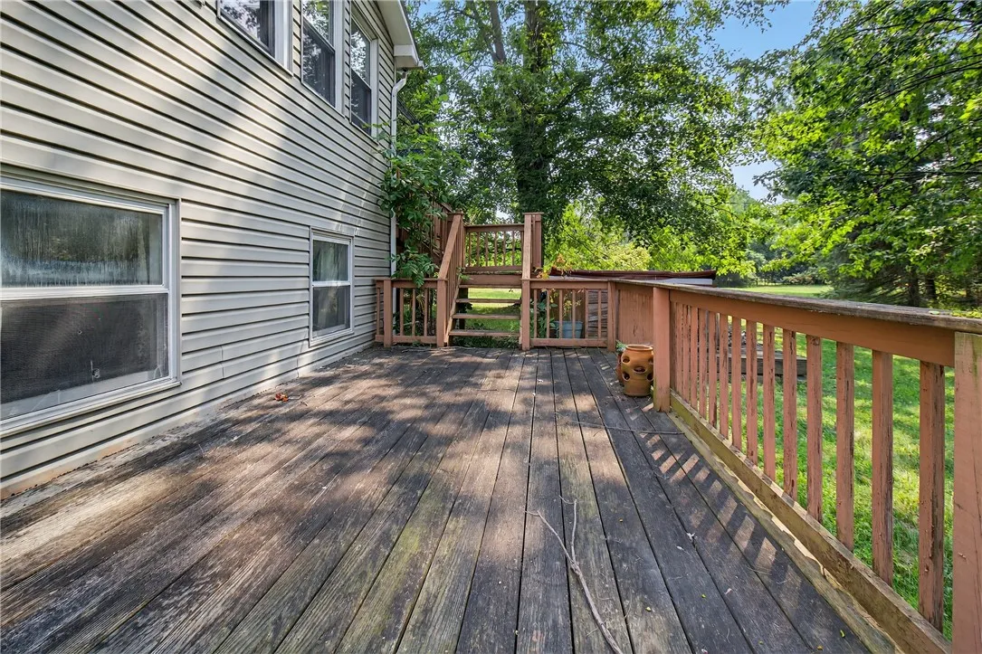 First level of the deck continues along the back length of the house
