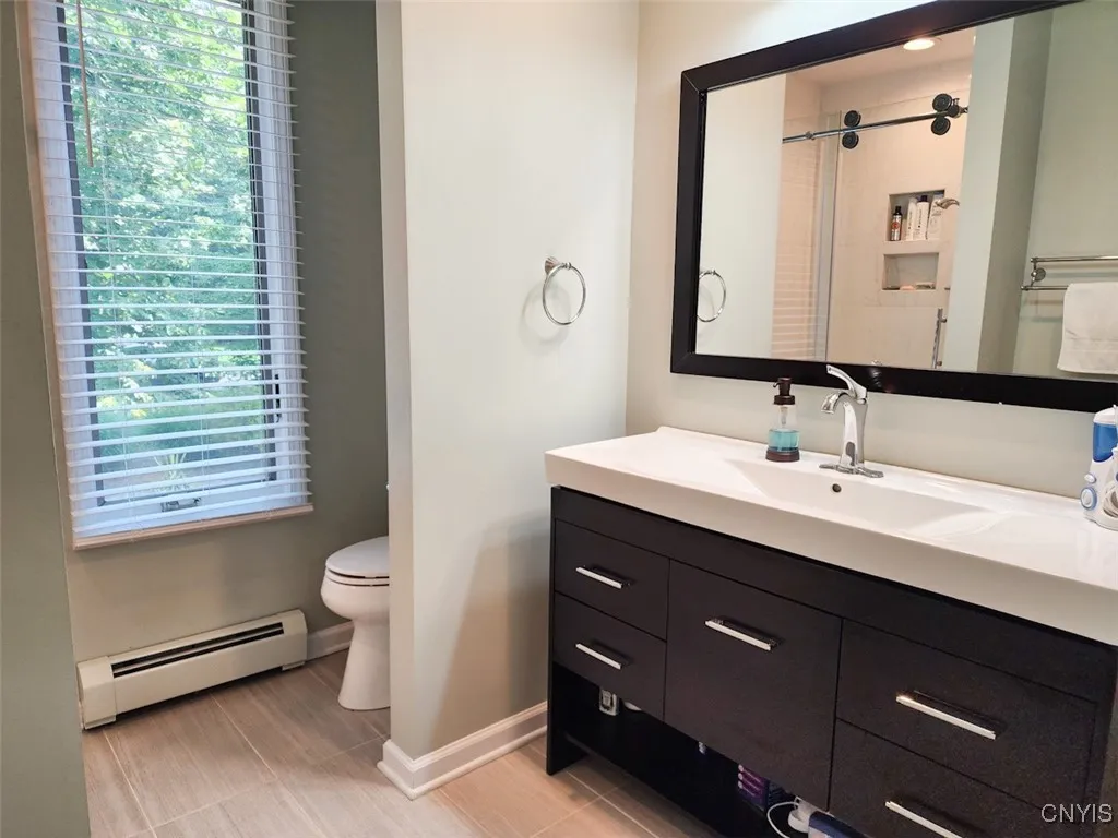Wow! Here is a look at the beautifully renovated Primary Bath.