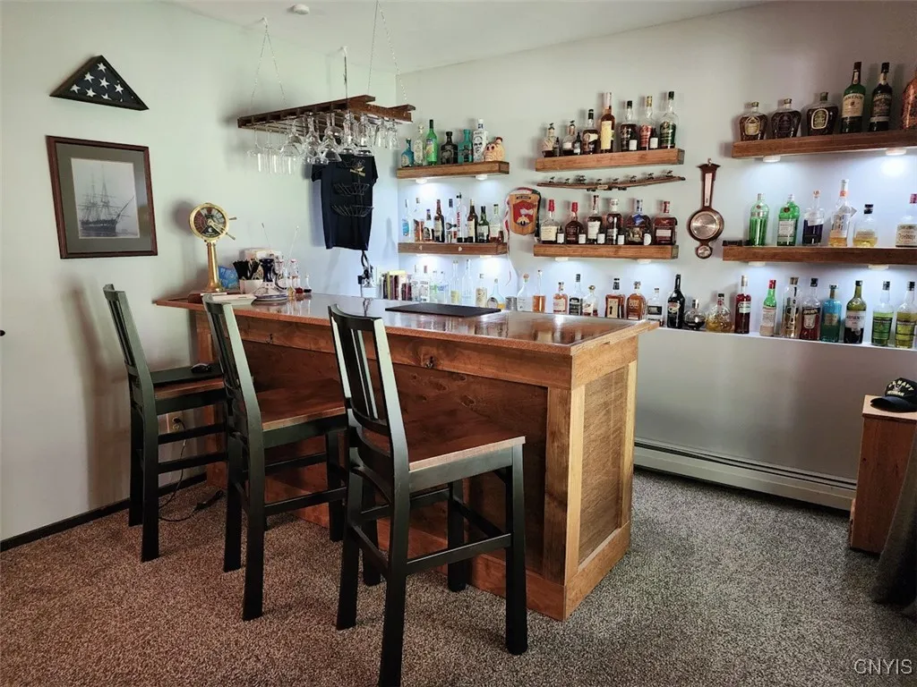 The 4th bedroom, located downstairs, has been turned into an awesome bar!
