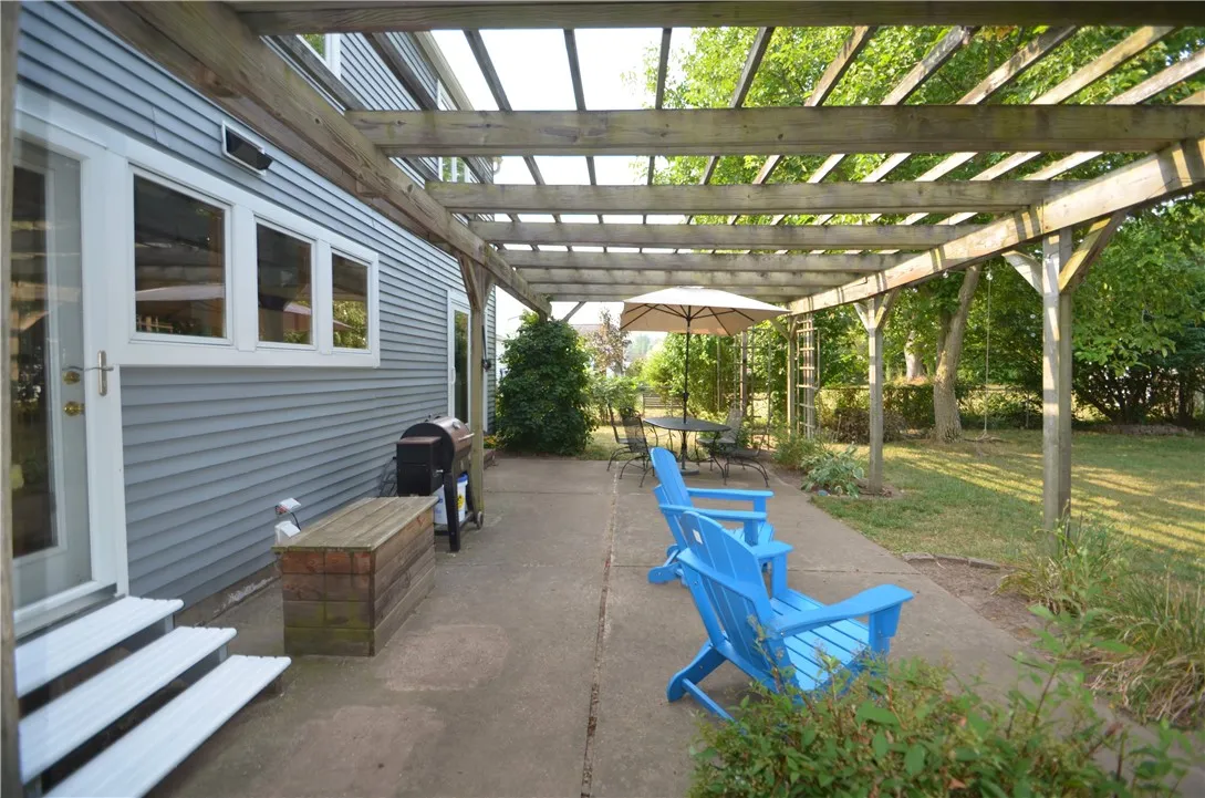 back yard patio with relaxing pergola